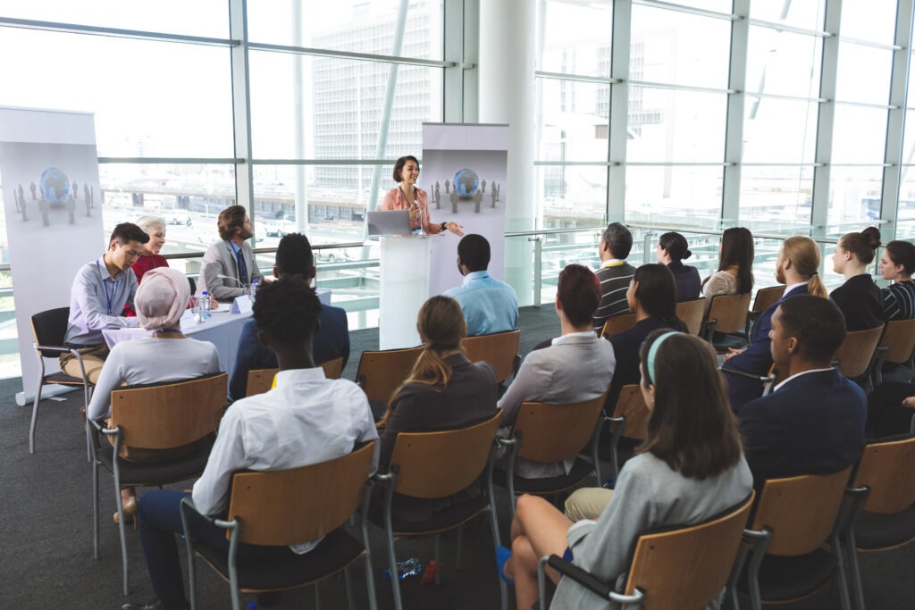 Businesswoman speaking in front of business people 2026 03 25 06 42 51 utc